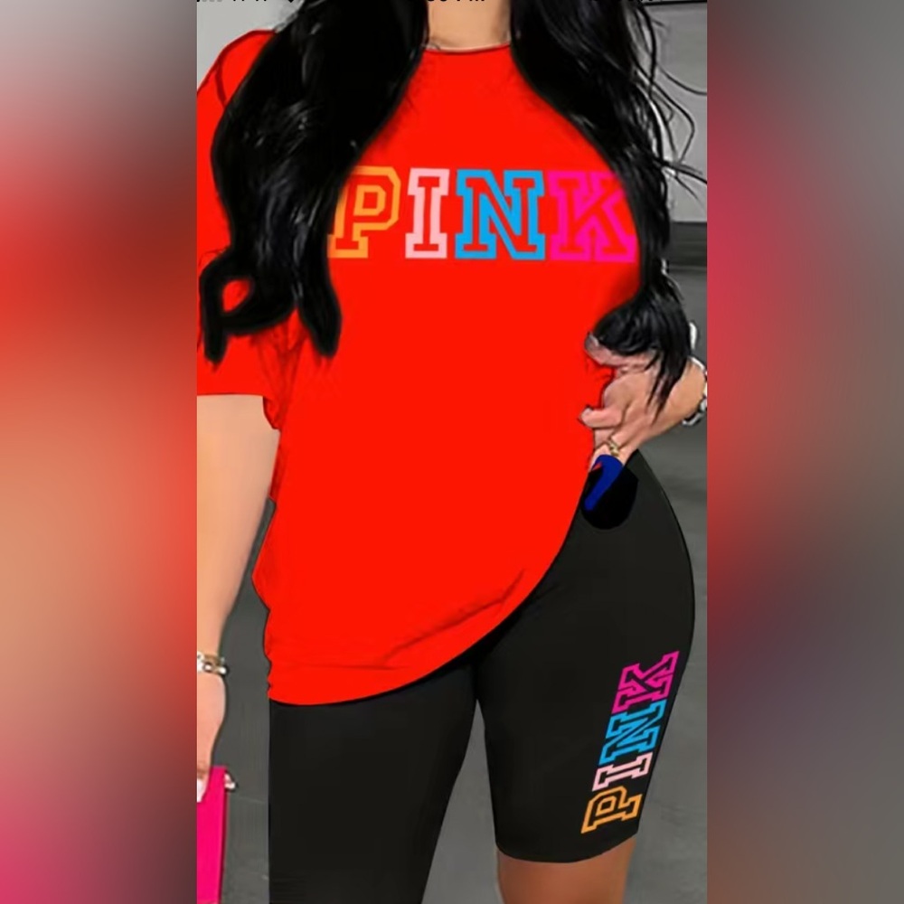 Women's Orange & Black Short Set with Multicolor Logo. Med (A)